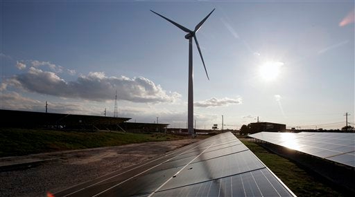  A windmill and solar array in Atlantic City. (Mel Evans/AP Photo) 