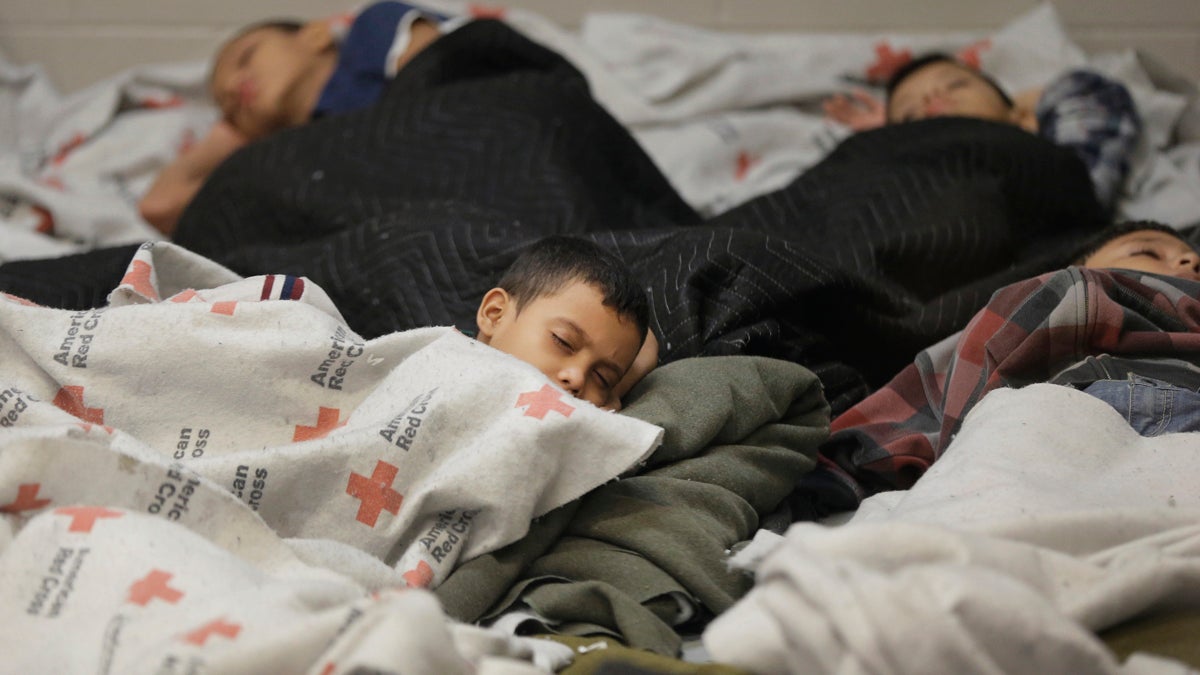  Last month, young detainees sleep in a holding cell at a U.S. Customs and Border Protection processing facility in Brownsville, Texas. Immigration courts backlogged by years of staffing shortages and tougher enforcement face an even more daunting challenge since tens of thousands of Central Americans began arriving on the U.S. border fleeing violence back home. (AP file photo/Eric Gay, pool) 