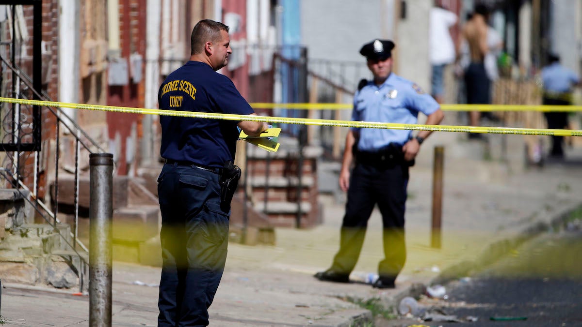  Philadelphia police at a crime scene.  (AP Photo/Matt Rourke) 