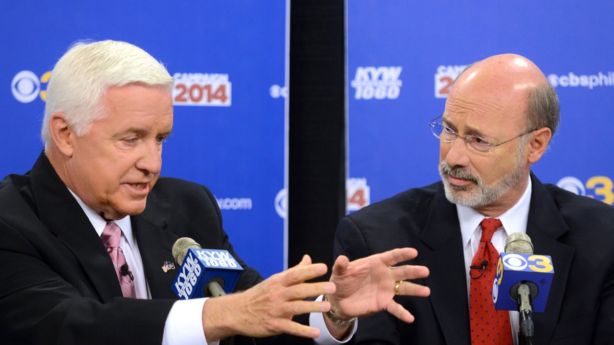  Republican Gov. Tom Corbett, (left), and Democratic challenger Tom Wolf take part in a debate at 'Breakfast with the Candidates' event at KYW-TV and KYW-AM on Wednesday, Oct. 1, 2014 in Philadelphia (Tom Gralish, Pool/AP Photo/The Philadelphia Inquirer) 