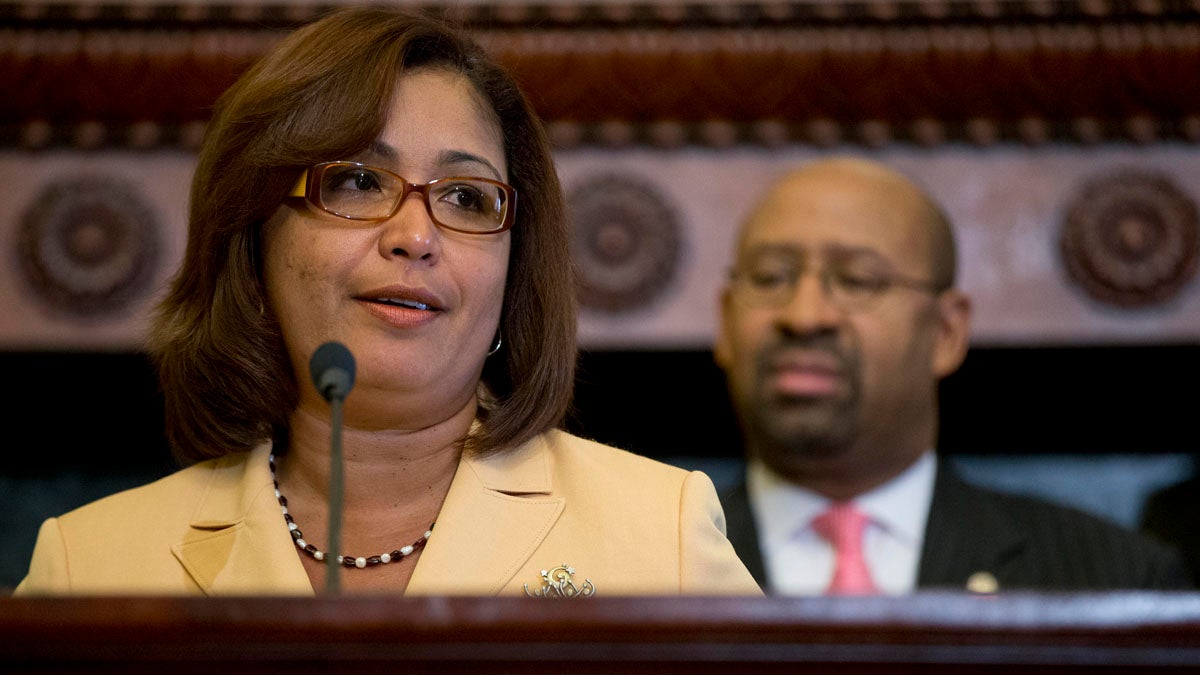  Philadelphia City Councilwoman Maria D. Quinones-Sanchez speaks as Philadelphia Mayor Michael Nutter looks on during a January signing ceremony for an ordinance creating the  municipal land bank. (AP file photo) 