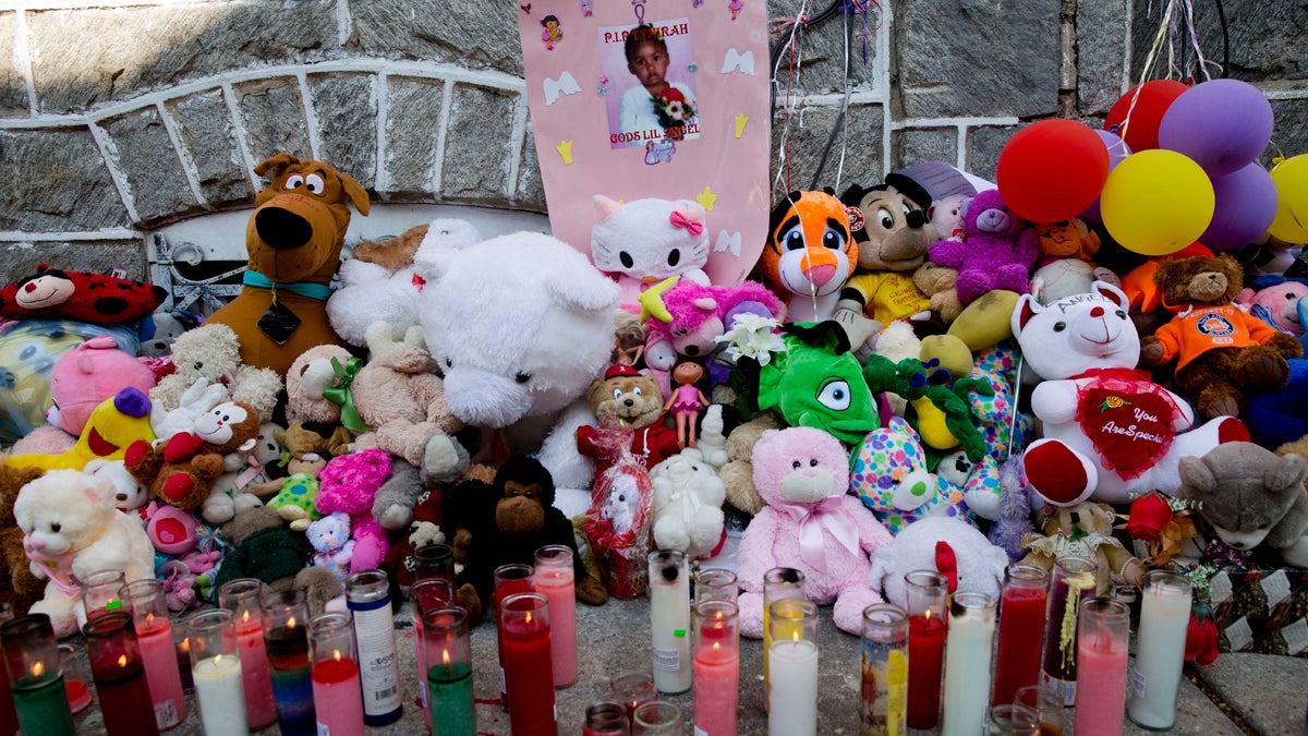  A makeshift memorial is dedicated to  3-year-old Tynirah Borum who was fatally shot in the chest by a stray bullet Aug. 1.(Matt Rourke/AP Photo) 