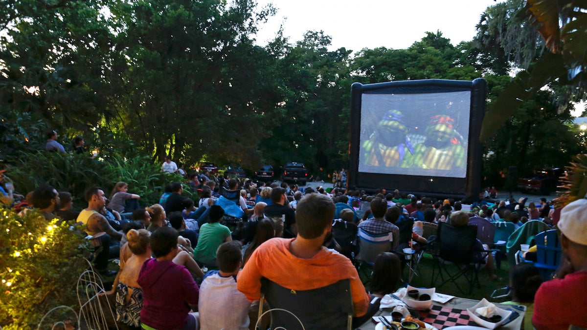  Outdoor movie screening. (AP Photo/John Raoux) 