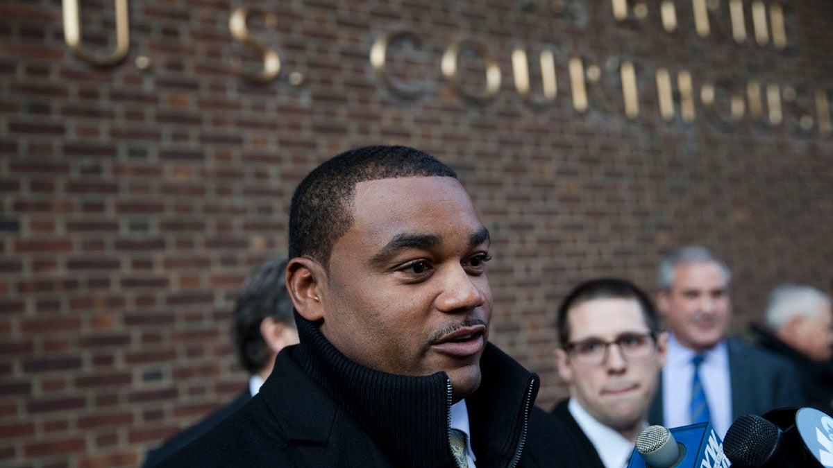  Former NFL player Shawn Wooden speak with members of the media after a hearing on the proposed NFL concussion settlement Wednesday outside of the U.S. Courthouse in Philadelphia. (AP Photo/Matt Rourke) 