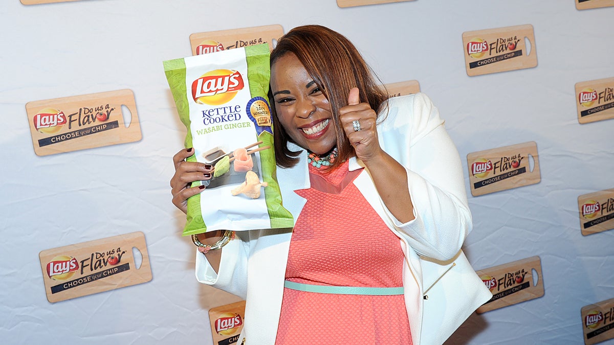  Meneko Spigner McBeth of Deptford, New Jersey, celebrates as her Lay's Kettle Cooked Wasabi Ginger potato chip flavor submission was named the $1 million grand-prize winner of a contest sponsored by the snack maker. (Diane Bondareff/Invision for Frito-Lay/AP Images) 