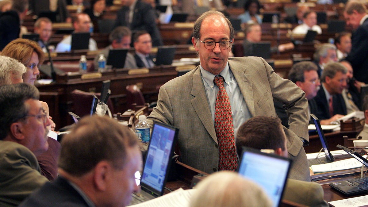 Rep. Chris Ross, R-Chester, talks to other lawmakers on the floor of the Pennsylvania House of Representatives at the Capitol in Harrisburg in 2006. He is retiring after 19 years. (AP file photo) 