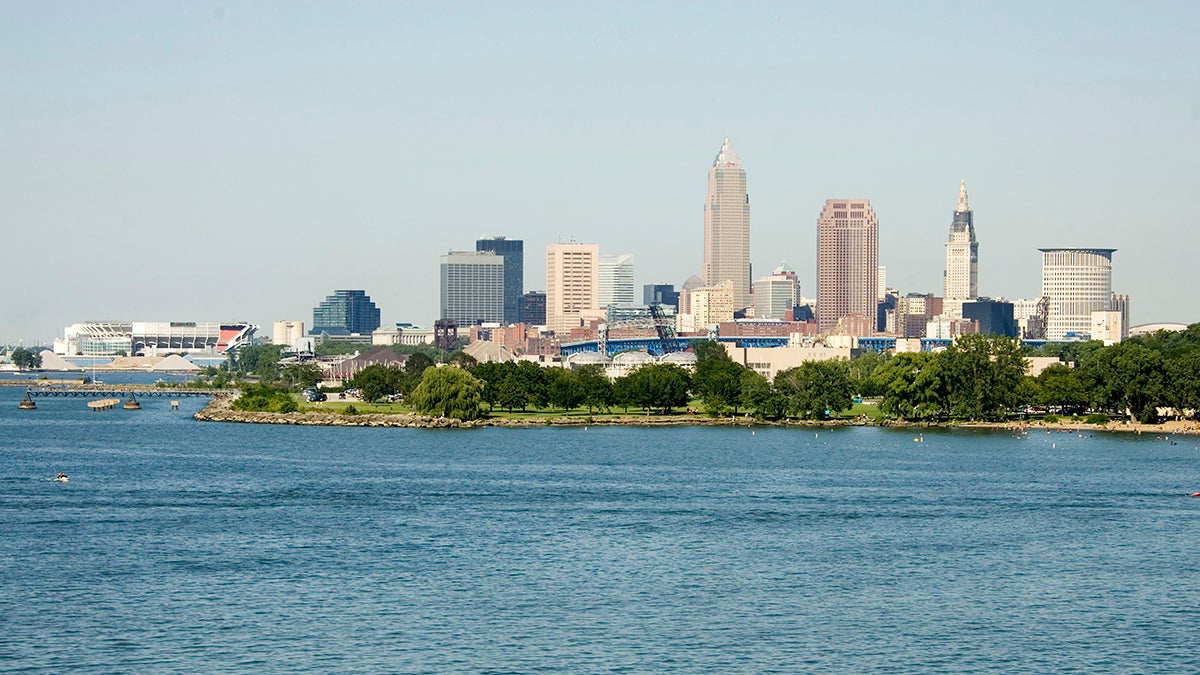  The downtown Cleveland skyline is seen on Lake Erie.  Cleveland is one of the cities installing a municipal broadband network that it hopes will bring about economic development. (AP Photo/Mark Duncan) 