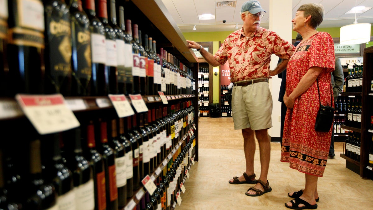 Customers check out the selection at a state wine and liquor store in New Hope. Pa. State lawmakers are once again considering changes to the system that would expand wine and beer sales to more private stores and give greater flexibility to the state stores.(AP file photo/Matt Rourke) 