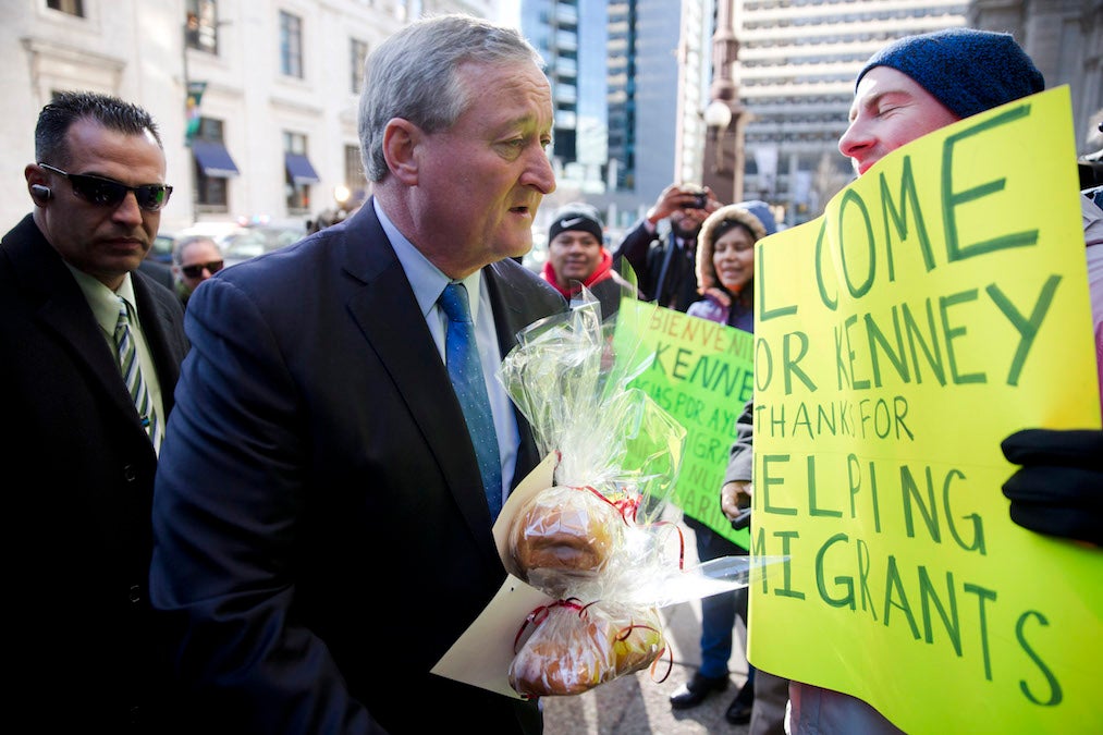 Philadelphia Mayor Jim Kenney greets immigration activists on the day of his inauguration last January. (AP Photo/Matt Rourke)