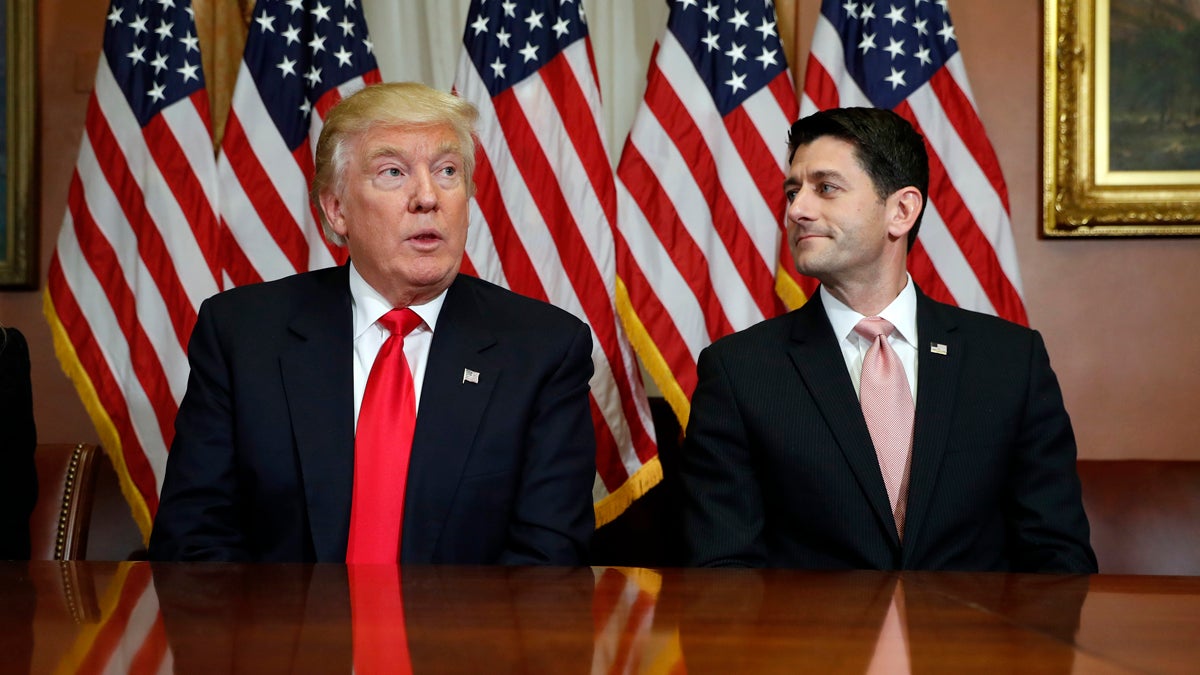 President-elect Donald Trump and House Speaker Paul Ryan pose for photographers. They are two-thirds of the GOP power triumvirate who will control the White House
