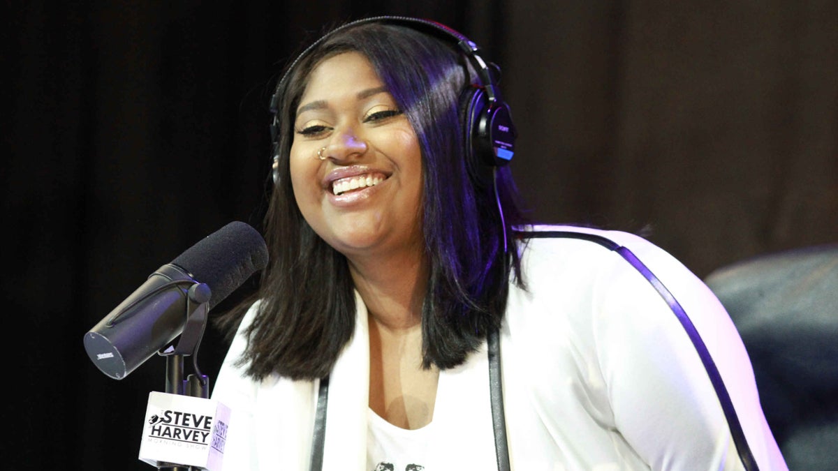  Jazmine Sullivan performs during the Steve Harvey Morning Show at the Georgia World Congress Center in August. (Photo by Robb D. Cohen/Invision/AP) 