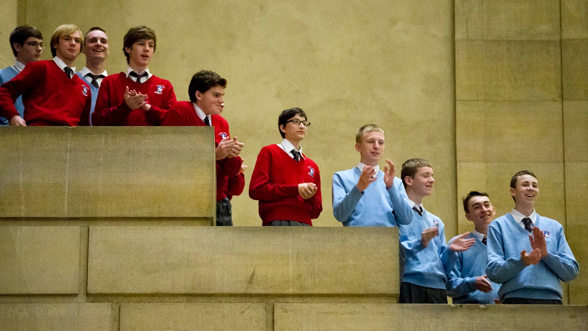  Catholic school students applaud the news in November that  Pope Francis would be in Philadelphia for the World Meeting of Families, a conference held every three years in a different city to celebrate the importance of family. (AP file photo) 