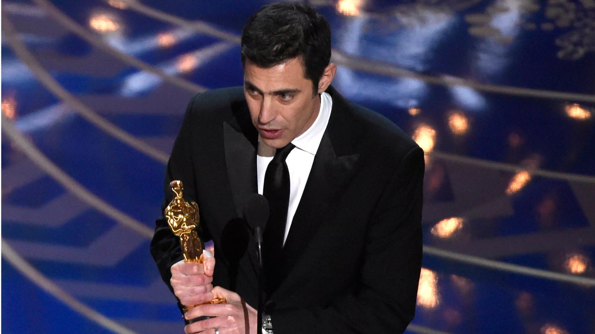 Josh Singer accepts the award for best original screenplay for “Spotlight” at the Oscars last month. (Photo by Chris Pizzello/Invision/AP)