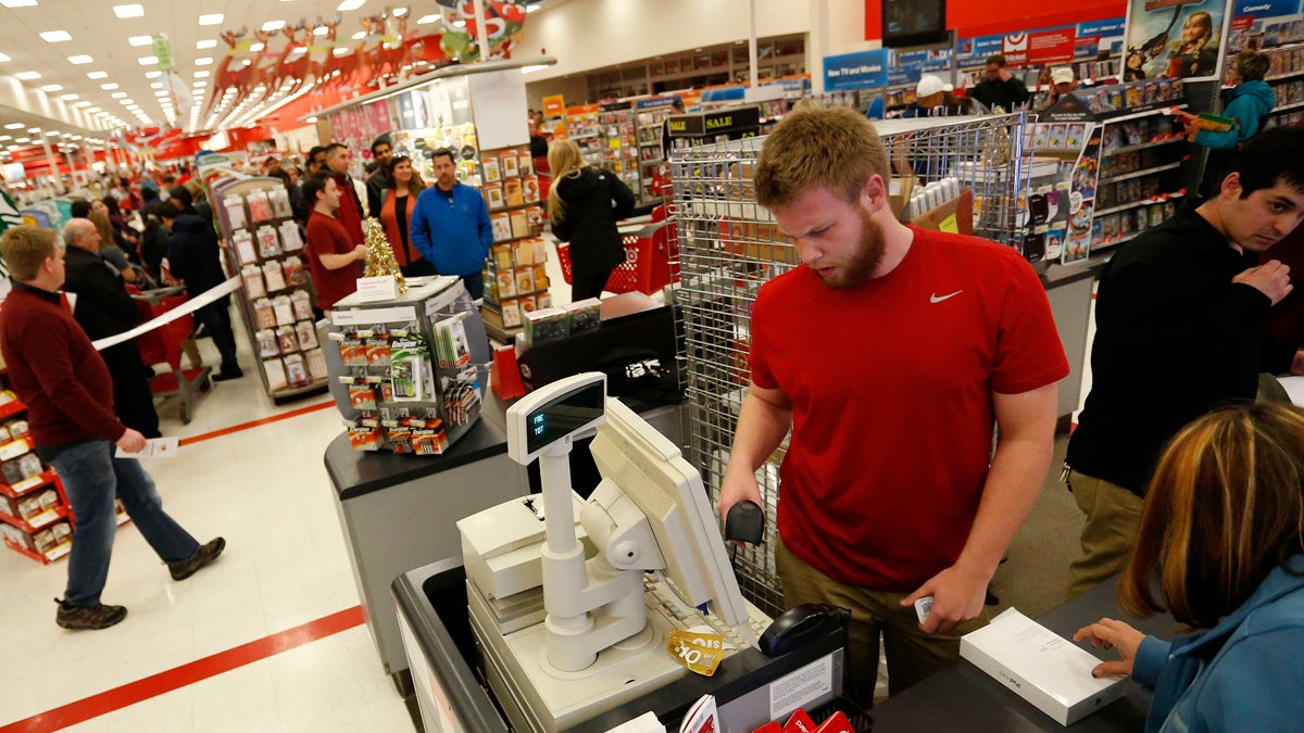  A cashier checks out a shopper buying several iPads on Thanksgiving last year at a Target store in Colorado. Efforts by employees of the Deptford Mall to keep the South Jersey mall closed on Thanksgiving have not succeeded. (AP file photo) 