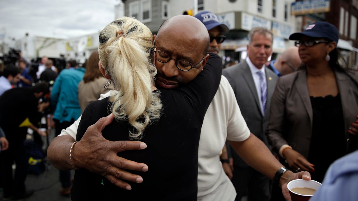 Philadelphia Mayor Michael Nutter hugs Lori Dee Patterson