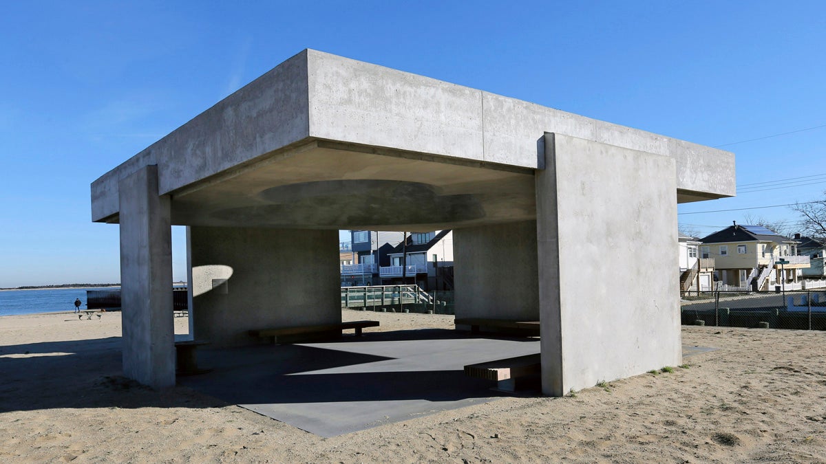  Residents want a large concrete structure on the beach in Highlands, New Jersey, removed. The state Department of Environmental Protection informed the  borough in November that the more than 1,000-square-foot monument is not permitted under the Coastal Area Facilities Review Act, which oversees development on the state's coastline.The borough is demanding that a trade group remove a monument to the survivors of Superstorm Sandy. (AP Photo/Mel Evans) 