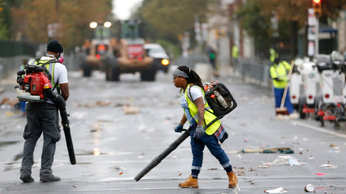  Workers use blowers during the cleanup process along Benjamin Franklin Parkway in Philadelphia a day after Pope Francis concluded his 10-day trip to Cuba and the United States. (Julio Cortez/AP Photo) 