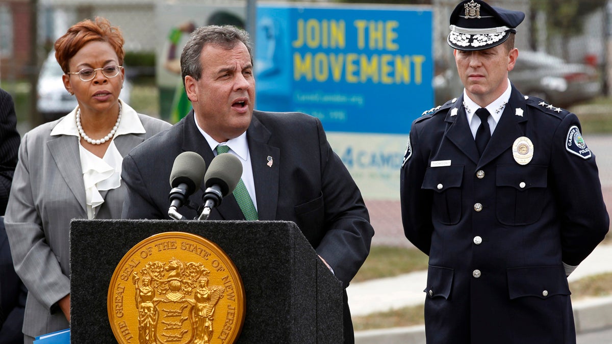 Dana Redd, Scott Thomson, Chris Christie Standing with Camden Mayor Dana Redd, left, and Chief of Police Scott Thomson, right, Gov. Chris Christie addresses a gathering in September. Christie delivered another speech in Camden Thursday on the criminal justice system. His focus on policy sets him apart from other contenders for the GOP presidential nomination, analysts say. (AP file photo)