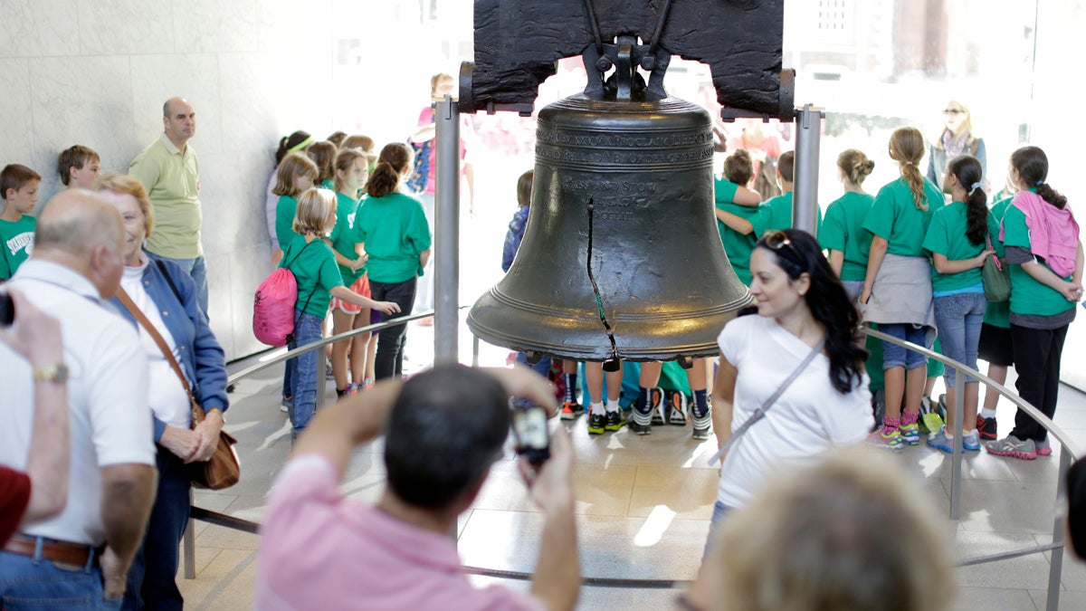  Tourists visit the Liberty Bell in Philadelphia. From January through June, hotels sold 416,000 room nights to leisure travelers -- up nearly 4 percent from a year ago. With Pope Francis and the World Meeting of Families coming to town, tourism officials predict a record-breaking year for city hotels. (AP file photo) 