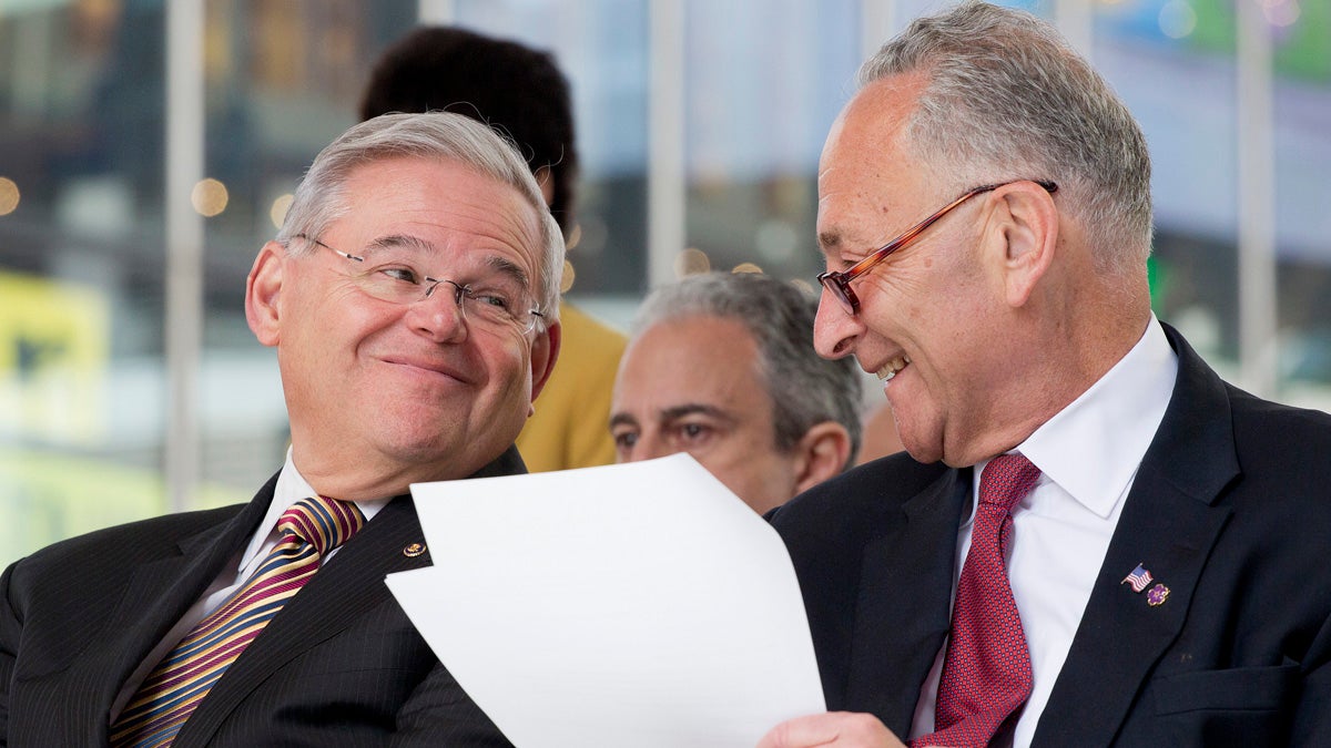  U.S. Sen Bob Menendez, left, of New Jersey speaks with U.S. Sen. Chuck Schumer of New York in April. Schumer opposes the Iran nuclear deal, while Menendez says he will decide by the end of this week. (AP file photo) 