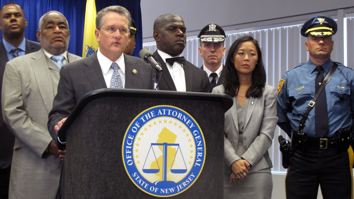  New Jersey Acting Attorney General John Hoffman announces policies regarding police body cameras during a news conference Tuesday in Trenton. Hoffman said that New Jersey would provide all state troopers in the field with the cameras, putting it among the first wave of states to take such action. (AP Photo/Geoff Mulvihill) 