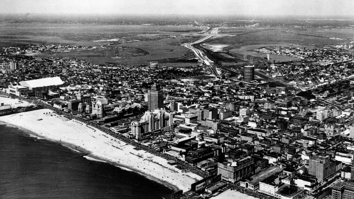 This is an aerial view of Atlantic City, N.J., with the famed boardwalk and beach in the foreground, on August 24, 1967. Seen on the left are the facilities of the Convention Hall, in the background is the new 70-mile-per-hour Atlantic City Expressway, which leads right into the heart of the city. (AP Photo) 