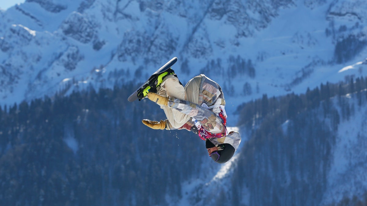  United States' Sage Kotsenburg takes a jump during the men's snowboard slopestyle final at the Rosa Khutor Extreme Park, at the 2014 Winter Olympics, Saturday, Feb. 8, 2014, in Krasnaya Polyana, Russia. (Sergei Grits/AP Photo) 