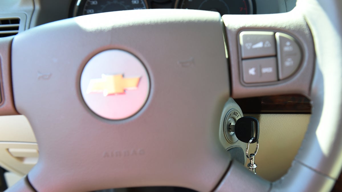  This April 1, 2014 file photo shows the steering wheel and ignition switch on a 2005 Chevrolet Cobalt in Alexandria, Va. General Motors’ recent recall of 2.6 million small cars has shed light on an unsettling fact: Air bags might not always deploy when drivers _ and federal regulators _ expect them to. (Molly Riley/AP Photo) 