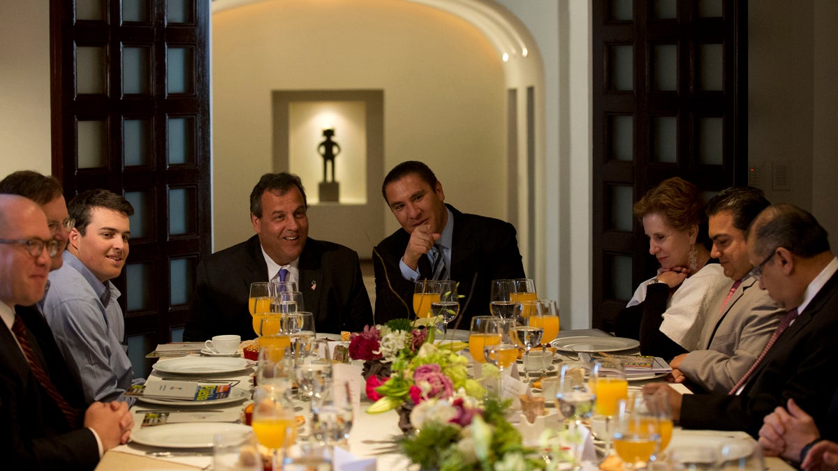  New Jersey Gov. Chris Christie, accompanied by his son Andrew, (left), talks with Puebla Gov. Rafael Moreno Valle, (center right), during breakfast at the governor's residence in Puebla, Mexico, Friday, Sept. 5, 2014. (Rebecca Blackwell/AP Photo) 