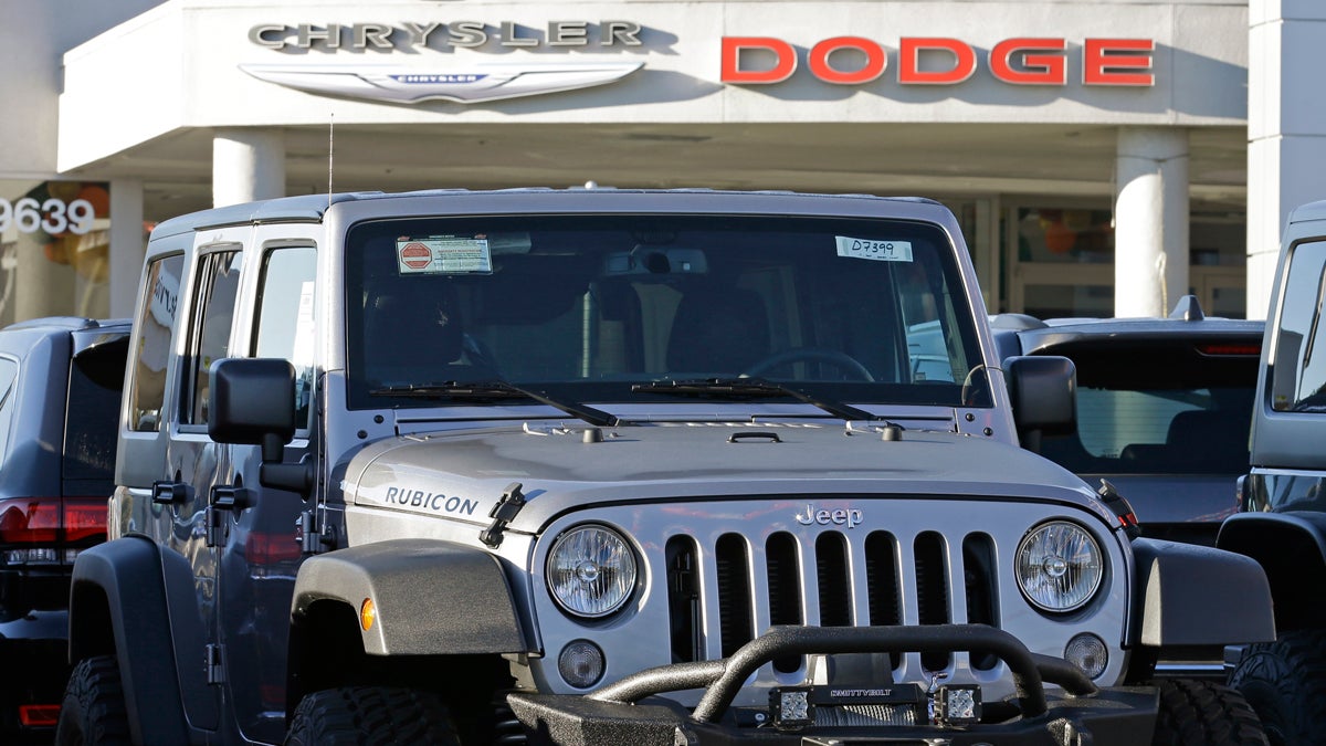  In this photo from Saturday, Nov. 7, 2015, a Jeep is seen for sale at a Chrysler / Dodge dealership (Ben Margot/AP Photo) 
