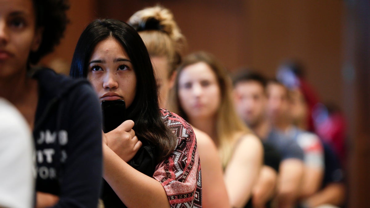 New students at San Diego State University watch a video on sexual consent during an August orientation meeting in San Diego. Defining consensual sex is a growing trend by universities under pressure to do more to protect victims.  (Gregory Bull/AP Photo)