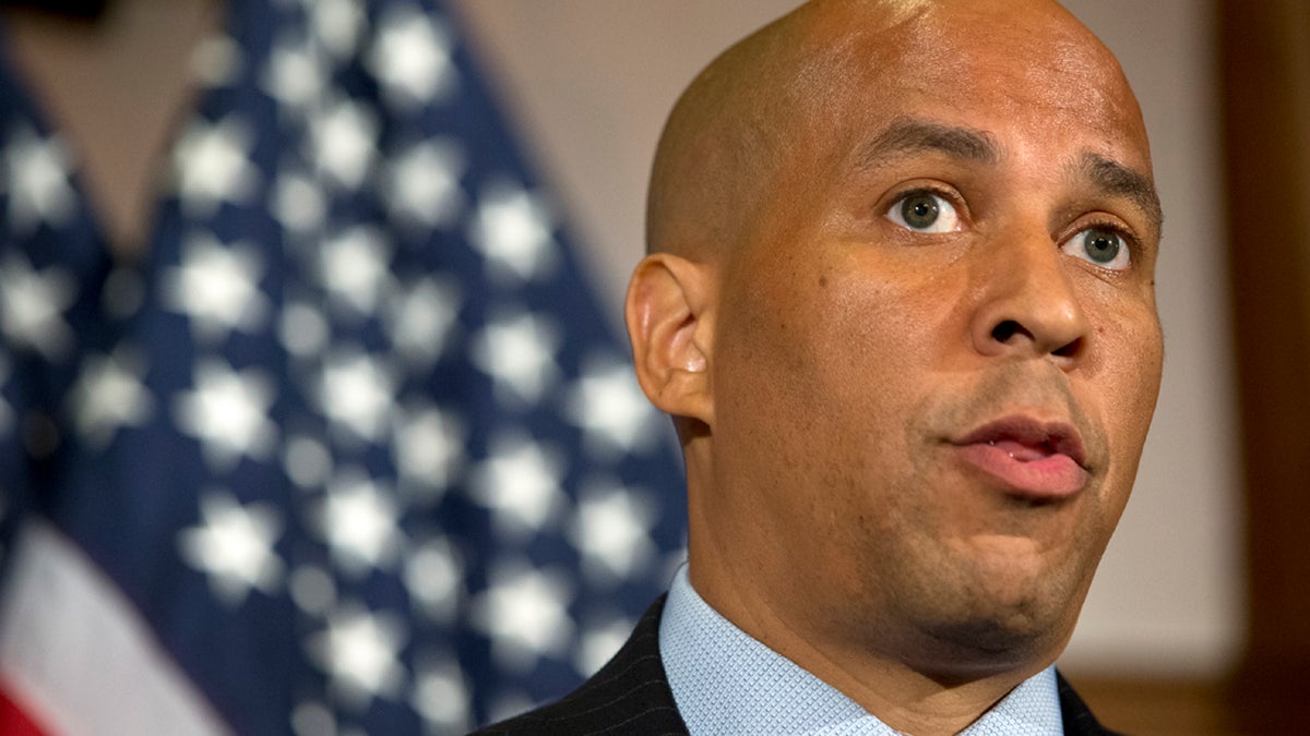  Sen. Cory Booker, D-N.J., asks questions during his first committee hearing since being sworn in last week. (J. Scott Applewhite/AP Photo, file) 