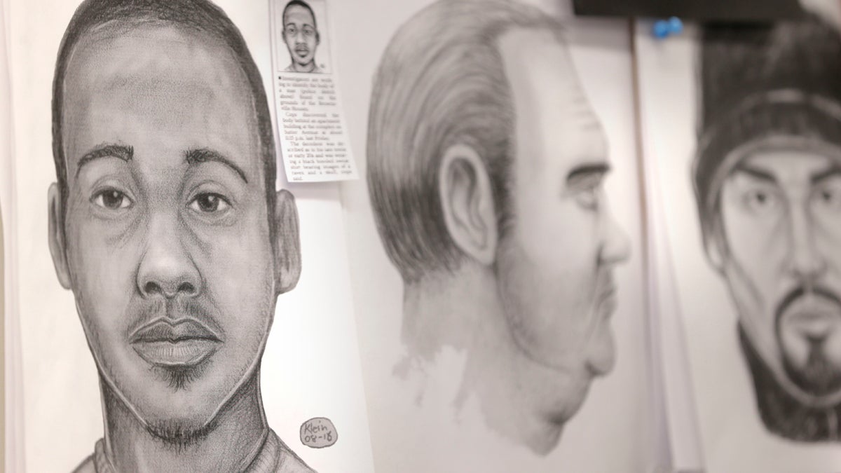 A sketch by police officer Matthew Klein of an unidentified man who committed suicide is displayed above Klein's work station in the NYPD Artist Unit in New York. (Seth Wenig/AP Photo)