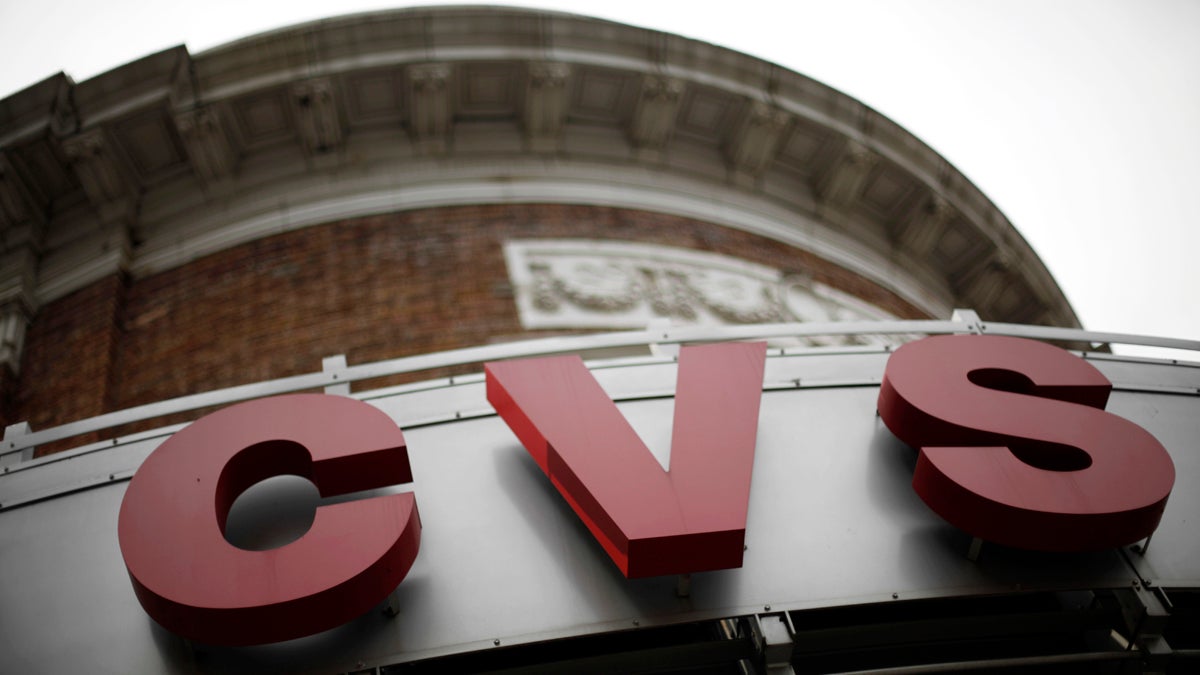 In this June 20, 2011 photo, the logo for a CVS store is displayed in Philadelphia. (Matt Rourke/AP Photo) 