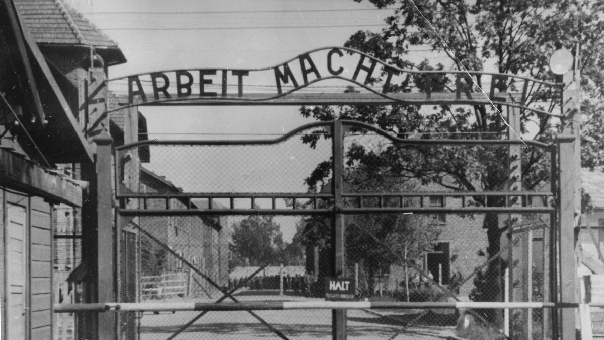  This undated file image shows the main gate of the Nazi concentration camp Auschwitz I in Poland, which was liberated by the Russians in January 1945. Writing over the gate reads: 'Arbeit macht frei' (Work Sets You Free). Germany has launched a war crimes investigation against an 87-year-old Philadelphia man it accuses of serving as an SS guard at the Auschwitz death camp, following years of failed U.S. Justice Department efforts to have the man stripped of his American citizenship and deported. Johann 'Hans' Breyer, a retired toolmaker, admits he was a guard at Auschwitz during World War II, but told the AP he was stationed outside the facility and had nothing to do with the wholesale slaughter of some 1.5 million Jews and others behind the gates. (AP Photo, file) 