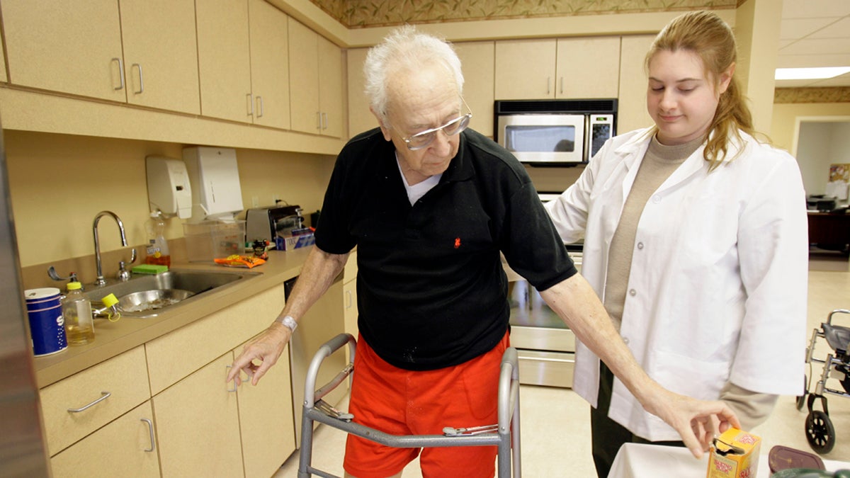 In this file photo a patient works with occupational therapist in Hatboro