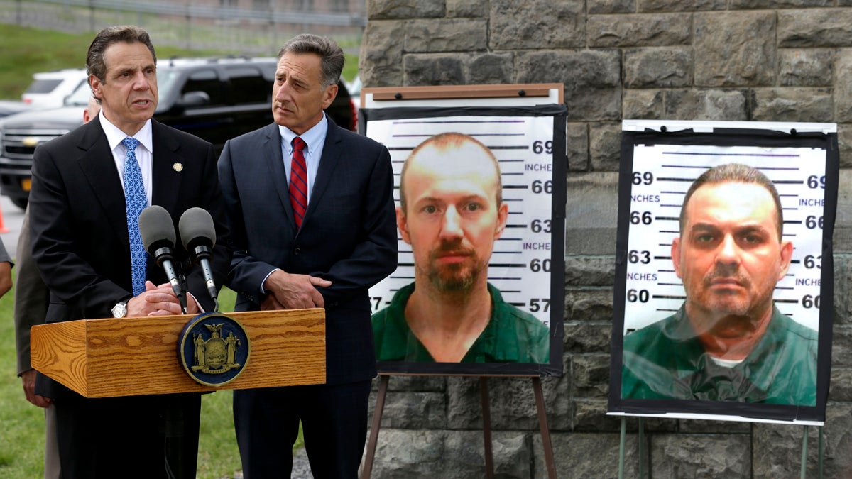  New York Governor Andrew Cuomo, (left), speaks while Vermont Governor Peter Shumlin listens during a news conference in front of the Clinton Correctional Facility in Dannemora, N.Y., Wednesday, June 10, 2015.  Police were resuming house-to-house searches near the maximum-security prison in northern New York where David Sweat and Richard Matt, two killers escaped using power tools, authorities said Wednesday as they renewed their plea for help from the public. (Seth Wenig/AP Photo) 