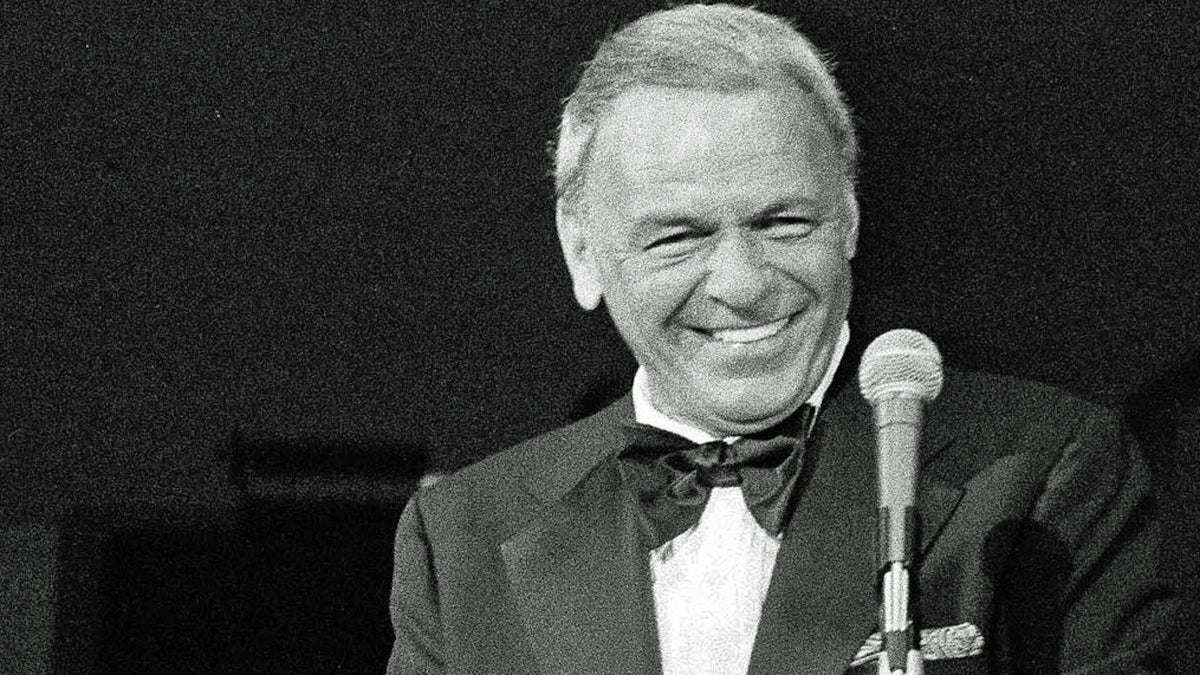  In this May 18, 1977 file photo, performer Frank Sinatra appears on the stage of the Westchester Premier Theater in Tarrytown, N.Y., during the opening night of his act with Dean Martin. (Ray Stubblebine/AP Photo, file) 