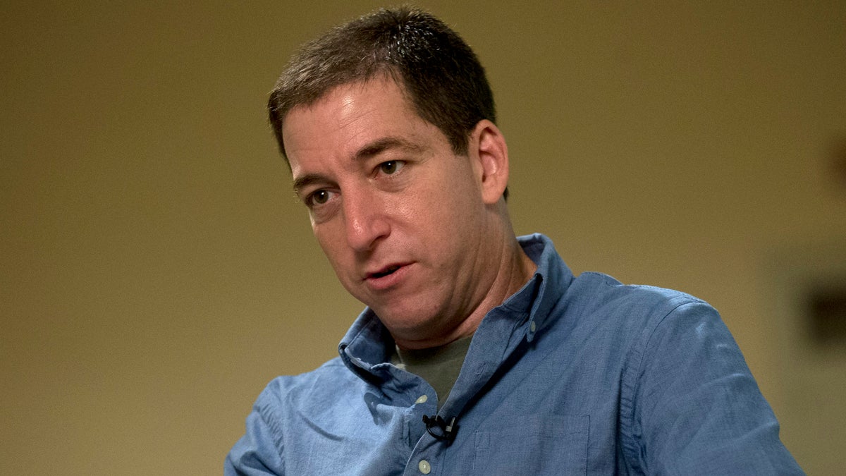  Journalist Glenn Greenwald speaks during an interview with the Associated Press in Rio de Janeiro, Brazil, Sunday, July 14, 2013. Greenwald, The Guardian journalist who first reported Edward Snowden's disclosures of U.S. surveillance programs says the former National Security Agency analyst has 
