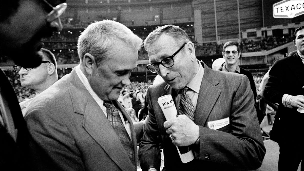  In this March 27, 1971, file photo, Villanova University basketball coach Jack Kraft (left) congratulates UCLA coach John Wooden after Wooden's Bruins defeated Villanova, 68-62, to win the NCAA championship in Houston, Texas. Villanova officials say former head basketball coach John 'Jack' Kraft died Thursday, Aug. 28, 2014, in New Jersey. He was 93. (AP Photo, file) 