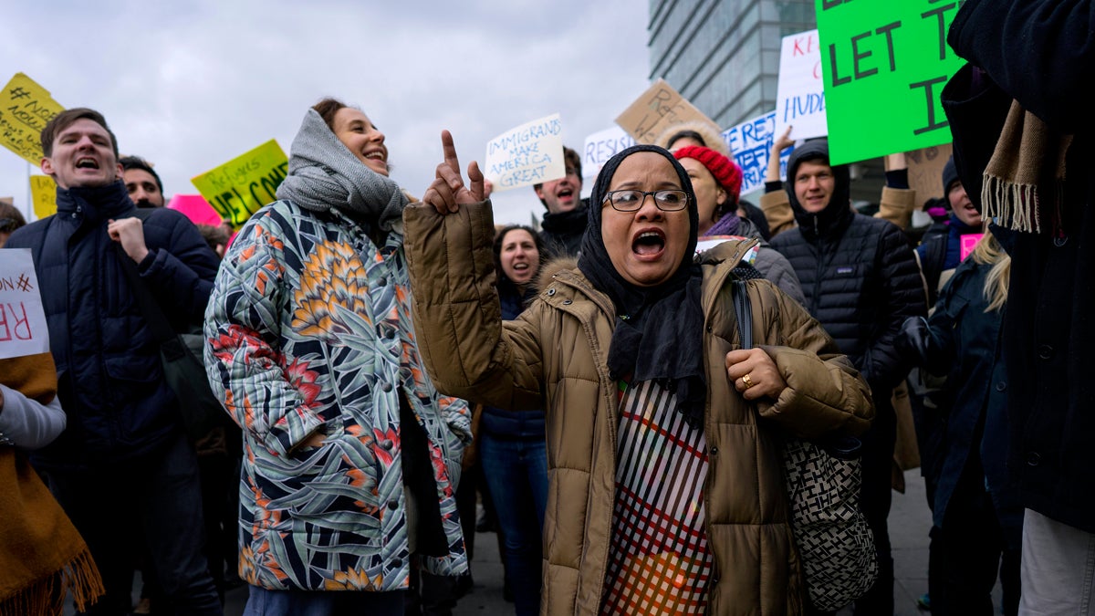 Protesters assemble at John F. Kennedy International Airport in New York, Saturday, Jan. 28, 2017 after two Iraqi refugees were detained while trying to enter the country. On Friday, Jan. 27, President Donald Trump signed an executive order suspending all immigration from countries with terrorism concerns for 90 days. Countries included in the ban are Iraq, Syria, Iran, Sudan, Libya, Somalia and Yemen, which are all Muslim-majority nations. (AP Photo/Craig Ruttle)