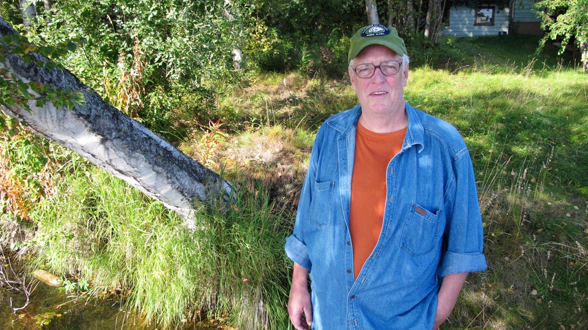  In this Sept. 3, 2010 file photo, author Joe McGinniss, who is working on a book on former Alaska Gov. Sarah Palin, poses for a photograph at the home he's renting next to Palin's home in Wasilla, Alaska. McGinniss, the adventurous and news-making author and reporter who skewered the marketing of Richard Nixon in 'The Selling of the President 1968' and tracked his personal journey from sympathizer to scourge of convicted killer Jeffrey MacDonald in the blockbuster 'Fatal Vision,' died Monday, March 10, 2014, at age 71. McGinniss, who announced in 2013 that he had been diagnosed with inoperable prostate cancer, died from complications related to his disease. (Dan Joling/AP Photo, file) 