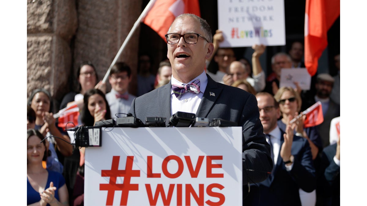  Jim Obergefell, the named plaintiff in the Obergefell v. Hodges Supreme Court case that legalized same sex marriage nationwide, is backed by supporters of the courts ruling on same-sex marriage on the step of the Texas Capitol during a rally Monday, June 29, 2015, in Austin, Texas. The Supreme Court declared Friday that same-sex couples have a right to marry anywhere in the United States. (Eric Gay/AP Photo) 