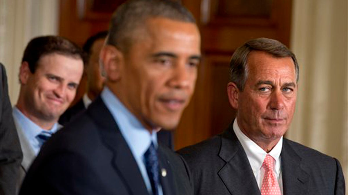  House Speaker John Boehner, R-Ohio, (right), watches President Barack Obama speak during a ceremony in the East Room of the White House, Tuesday, June 24, 2014 in Washington (Jacquelyn Martin/AP Photo, file) 