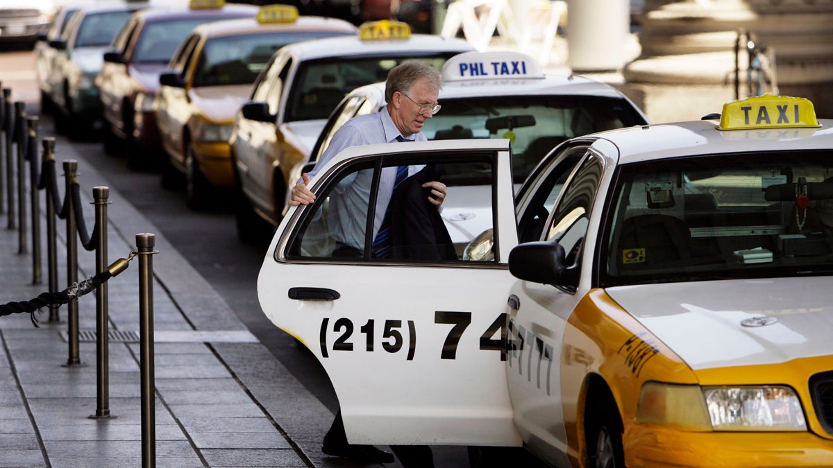  A man climbs into a cab at the 30th Street Station in Philadelphia. (Matt Rourke/AP Photo, file) 