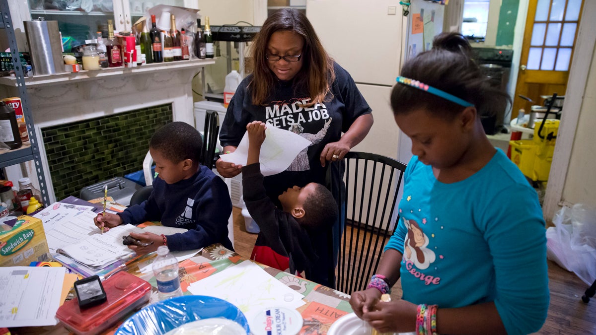 This AP file photo shows a Philadelphia family who receives money from the Supplemental Nutrition Assistance Program (Matt Rourke/AP Photo)