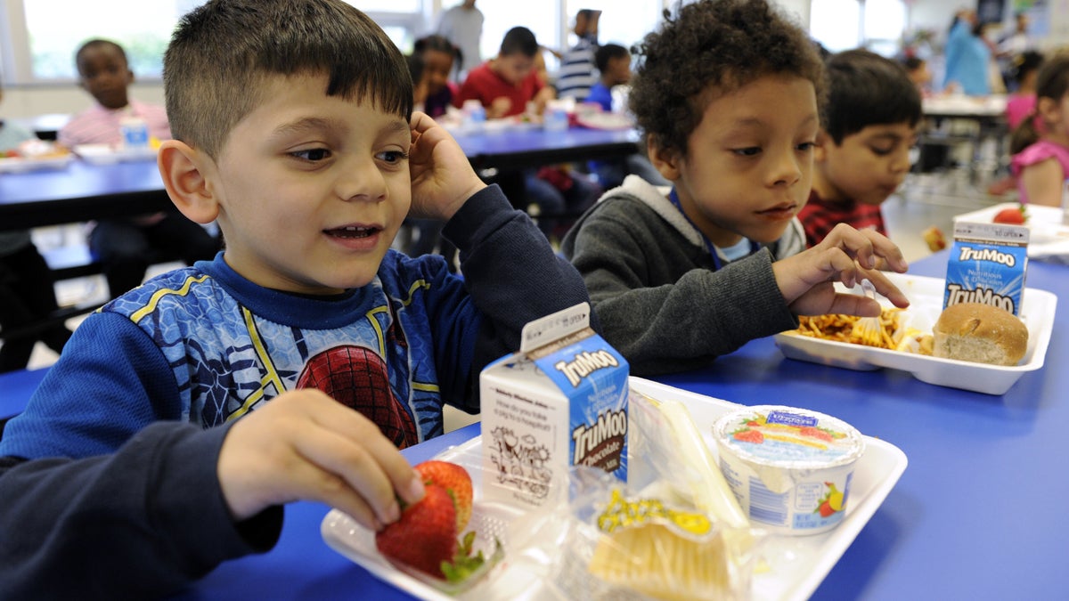  In this April 29, 2014 file photo, two elementary school boys, ages 5 and 6, eat lunch (Susan Walsh/AP Photo) 