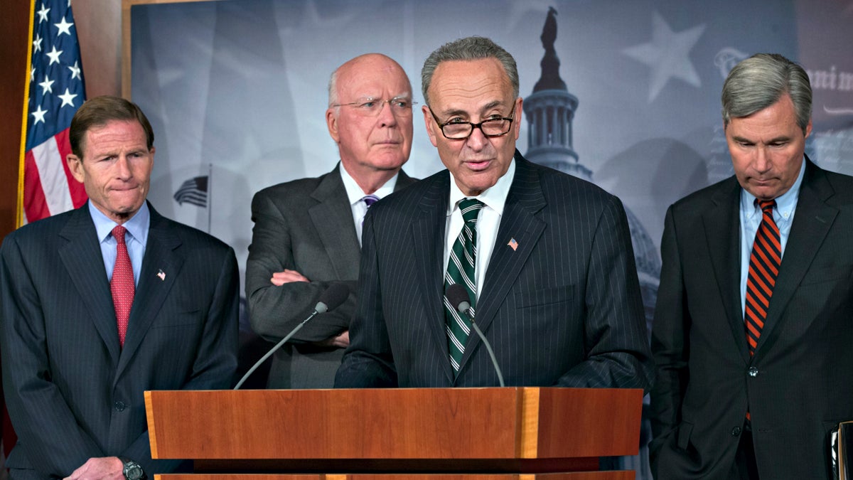  Sen. Chuck Schumer, D-N.Y., center, speaks to reporters after Senate Republicans derailed Obama's selection of Georgetown law professor Cornelia Pillard to fill one of three vacancies on the U.S. Court of Appeals for the District of Columbia Circuit, at the Capitol in Washington, Tuesday, Nov. 12, 2013. Sen. Richard Blumenthal, D-Conn., Senate Judiciary Committee Chairman Patrick Leahy, D-Vt., amd Sen. Sheldon Whitehouse, D-R.I., listen. (J. Scott Applewhite/AP Photo) 