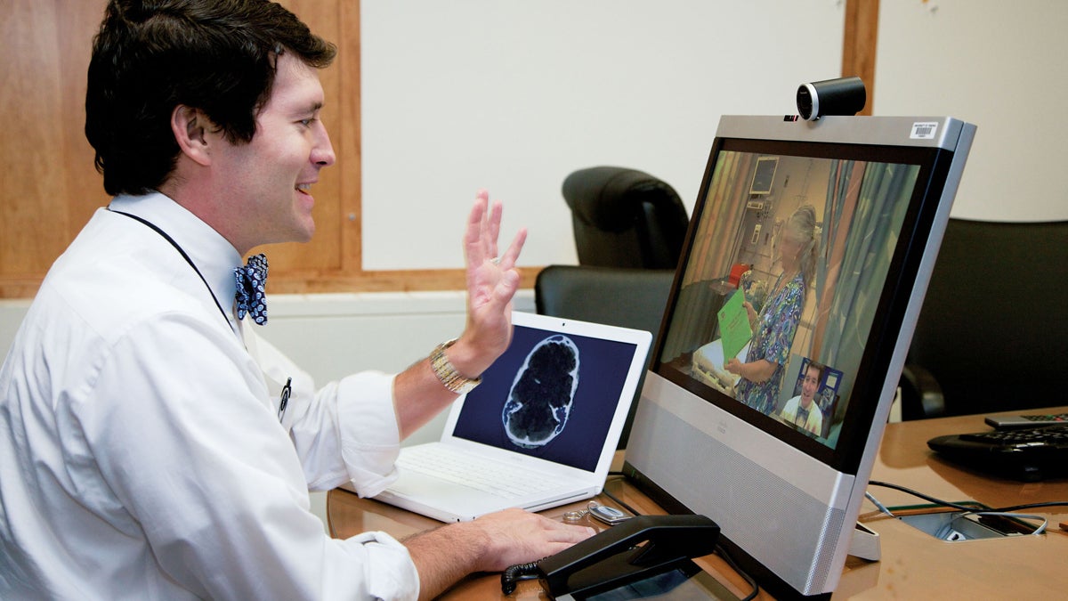  Neurologist Andy Southerland, M.D., participates in telemedicine encounter which is emerging as a way of providing patients in under-served locations with access to specialty consultations. (PRNewsFoto/Verizon) 