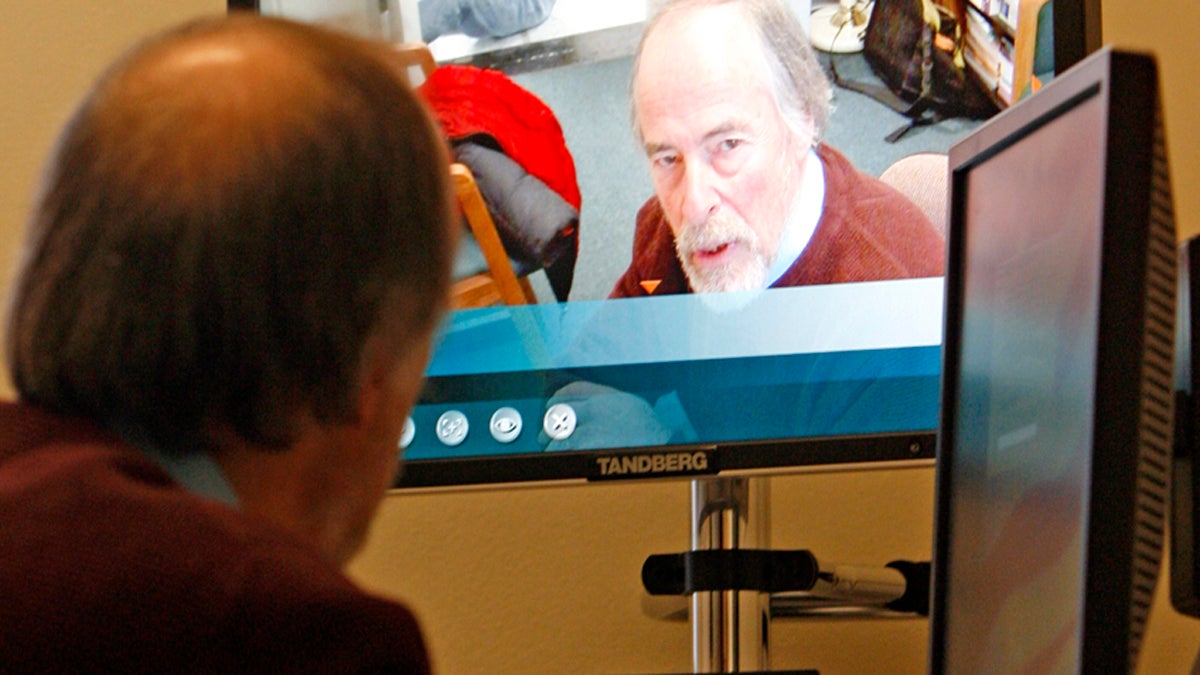  A psychiatrist counsels patients via Web cams, reaching people who sometimes went without such services. (Toby Talbot/AP Photo) 